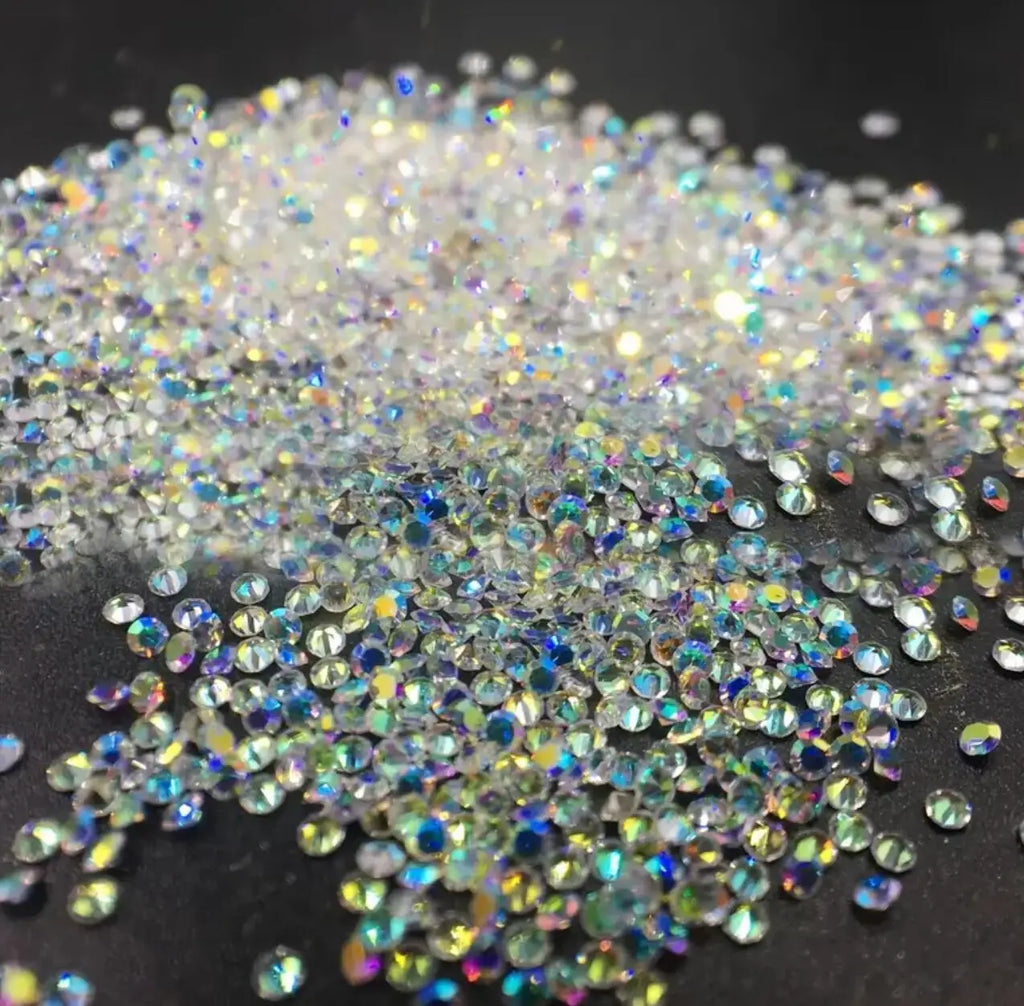 1Bag Aprox.1400Pcs Mini Nail Rhinestones Micro 1.2mm Nail Sand Pixie Crystals Iridescent AB Bling Tiny Sugar Beads Nail Charms *