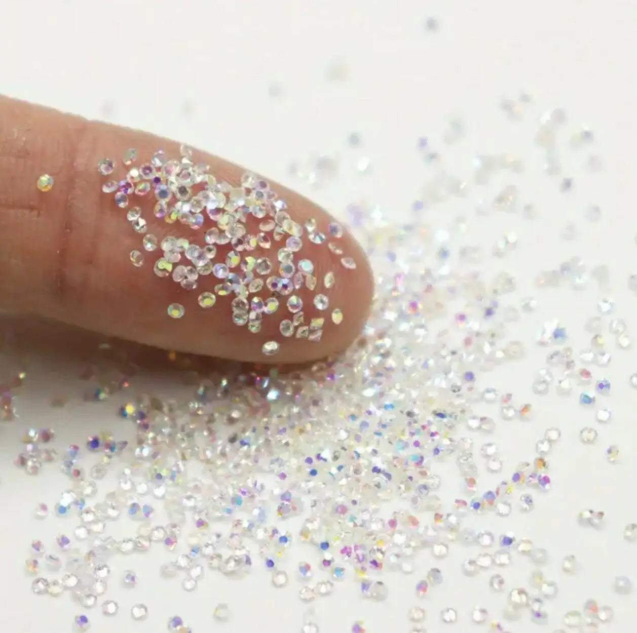 1Bag Aprox.1400Pcs Mini Nail Rhinestones Micro 1.2mm Nail Sand Pixie Crystals Iridescent AB Bling Tiny Sugar Beads Nail Charms *