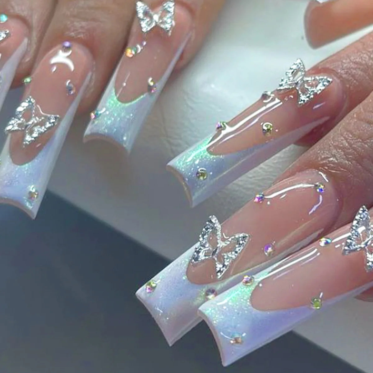 24 pieces of gentle nude long press-on nails (square shape), paired with 1 piece of jelly glue and 1 nail file